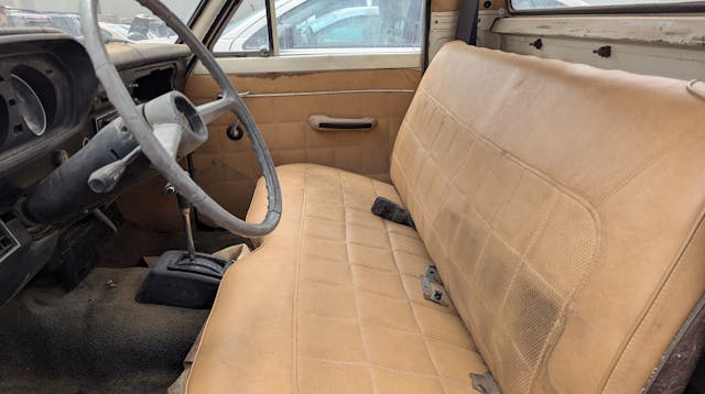 1976 Ford Courier shifter plate interior seat