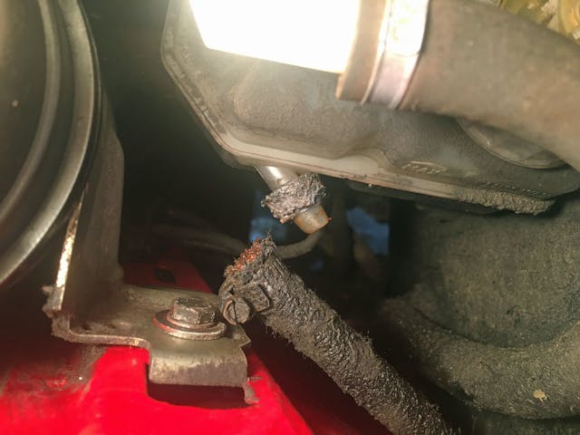 vintage bmw broken clutch fluid line