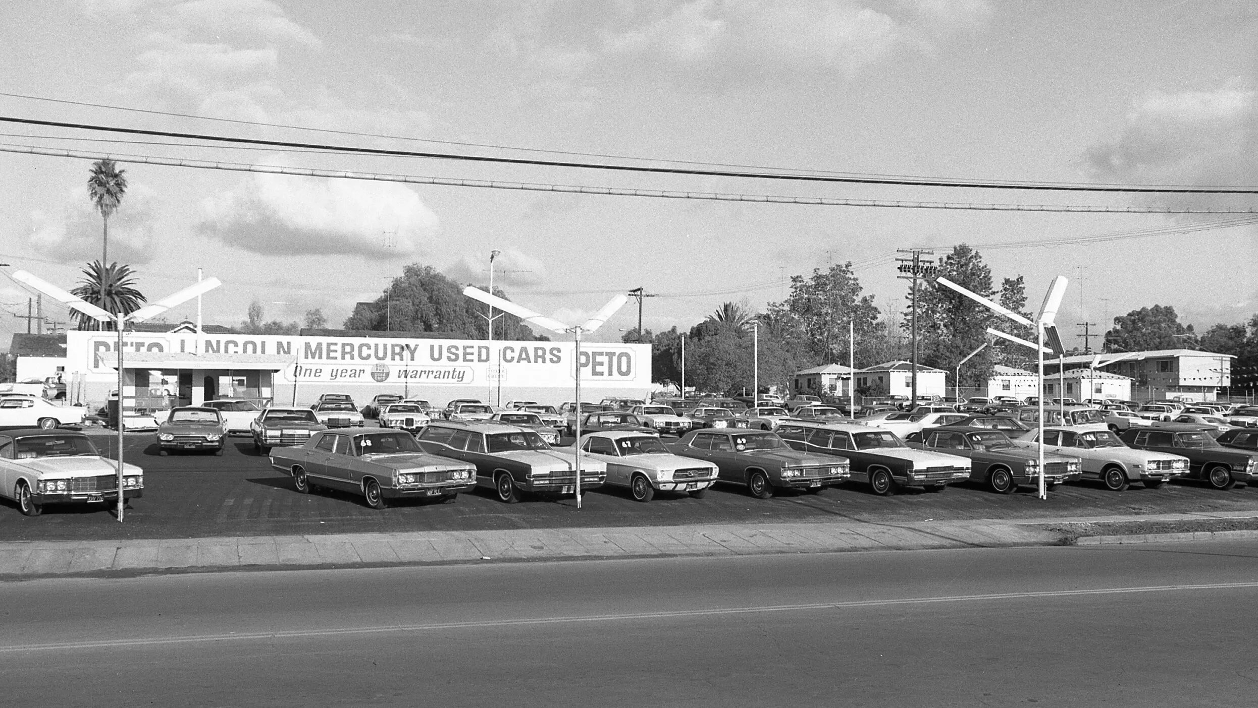 Used car dealership early 70s